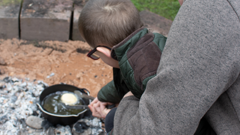 Cooking on the fire with a 4 year old